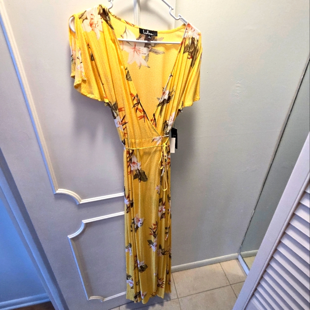 Tiger Lily LuLu Dress. Size Small. W/ tag. Brand New. Adjustable string.
